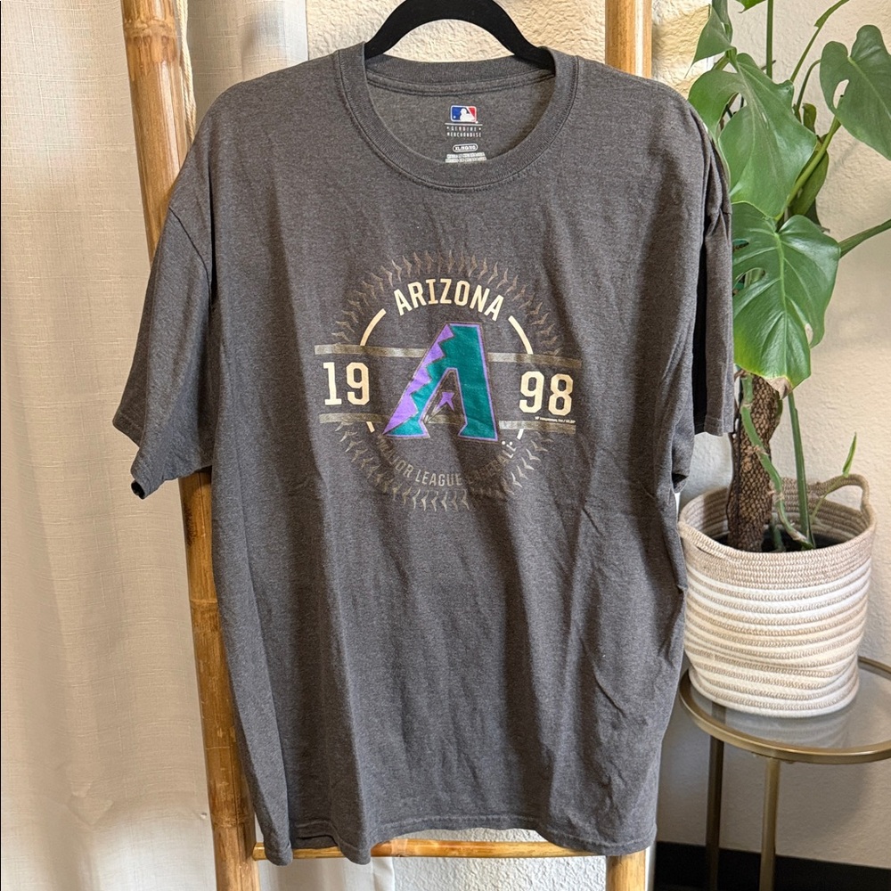 Genuine Merchandise Gray T-Shirt
